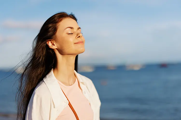 Relaxed person breathing exercise